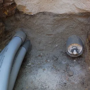 Power and data conduit being installed in the Arroyo Section
