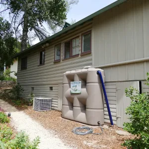 Home Demonstration Garden Renovation, rainwater collection system on west side of Cottage
