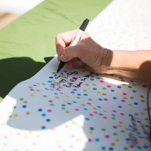 Cultivating the Wild: Native Gardens Tour and 90th Birthday Celebration, birthday card signing