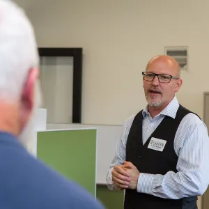 Pritzlaff Conservation Center Ribbon Cutting Celebration, Steve Windhyager leading tour in research workstation area