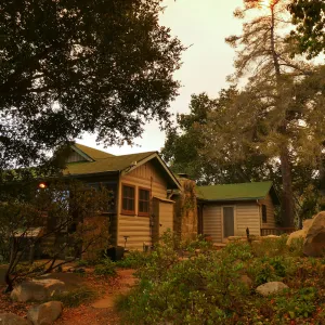 Cottage in smoke-filtered light from Rey Fire