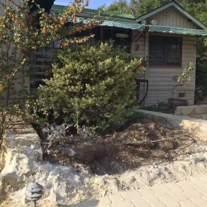 Demolition of seat wall at Home Demo Garden