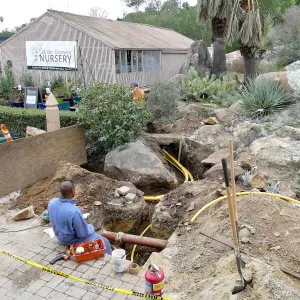 Gas line rerouting in Courtyard and Garden Growers Nursery