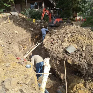 Power and data conduit being installed in the Arroyo Section