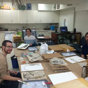 Chris Garrotte, Denise Knapp, Matt Guilliams mounting herbarium specimens