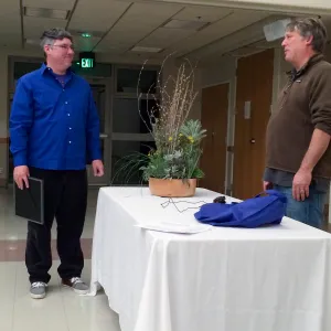 Randy Baldwin presenting Bruce Reed with Horticulturist of the year award