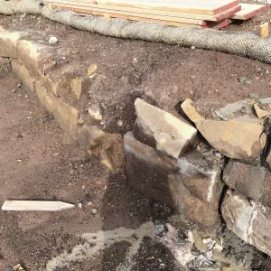 Reconstruction of wall west side of Pritzlaff Conservation Center