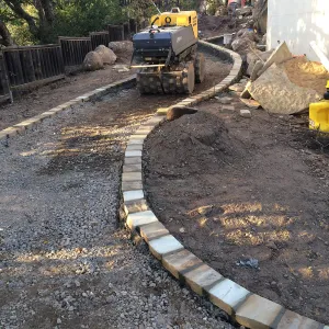 Preparing new path to Cottage and Water Wise Home Garden