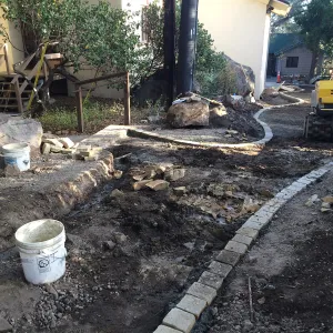 Preparing new path to Cottage and Water Wise Home Garden