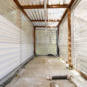Garden Growers Lath House before start of repairs. Interior of heated mist bed in northwest corner.