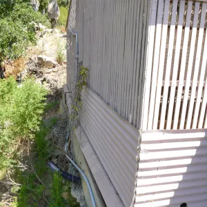 Garden Growers Lath House before start of repairs. Looking north across west wall exterior.