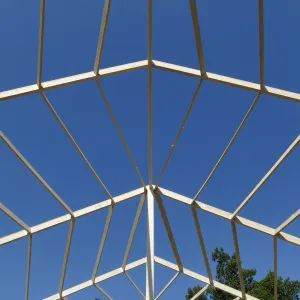 Garden Growers Lath House during repairs, roof framing looking west from interior