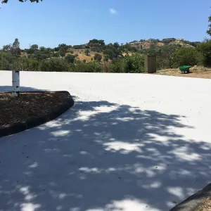 Light colored ecosealant on upper parking lot
