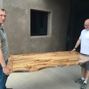 Steve Windhager and Sven Nebelung with new table for director's office