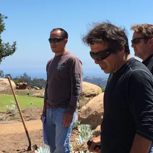 Fernando Orta, Michele Bandinu, Mike Jacobson installing Island Sculpture