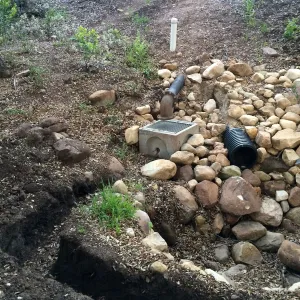 Installation of runoff collection pipe connection from Pritzlaff Conservation Center to well tank