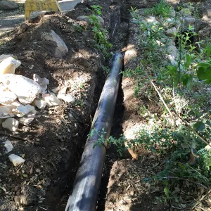 Installation of runoff collection pipe connection from Pritzlaff Conservation Center to well tank