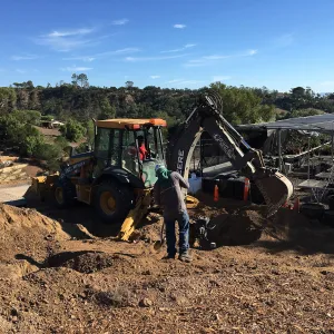 Putting in new electrical line to Horticulture Head House