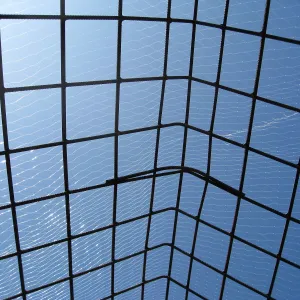 Construction of Herb Parker's â€˜Haven' labyrinth, roof framework and netting
