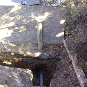 Irrigation water line repair in main parking lot, just south of the bike rack, looking north