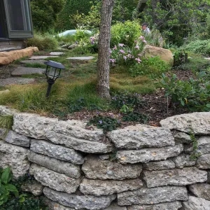 Recycled concrete wall in Isabelle Greeneâ€™s garden