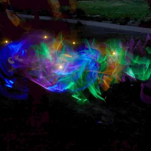 Family Nature Night, children playing with glow sticks
