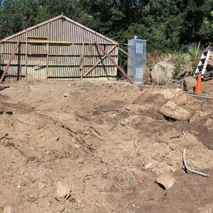 Repair of Garden Growers Lath House, looking west