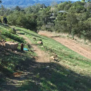 Building new trail on west slope of PCC ridge for new Island Section