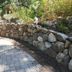 Rebuilt rock wall by Campbell Bridge