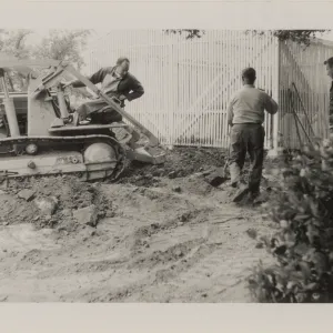 Breaking ground with tractor, Carl, Joe, Jim