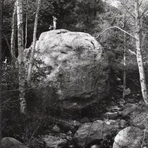 people standing on top of Lassiter Boulder
