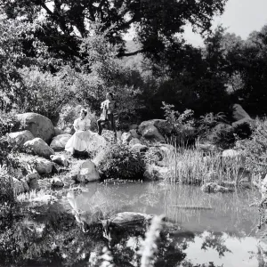 Senor and Senorita beside one of the many pools in the Garden