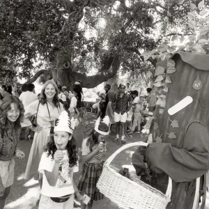 Family Festival, SBBG. A tree with a basket and families having fun