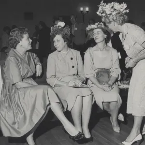 Katherine Muller with three ladies wearing hats