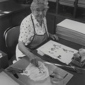Jean Hobson mounting pressed plant specimens in the Herbarium