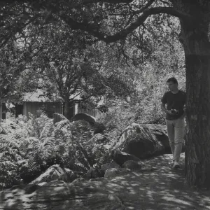 visitor with camera in the Garden