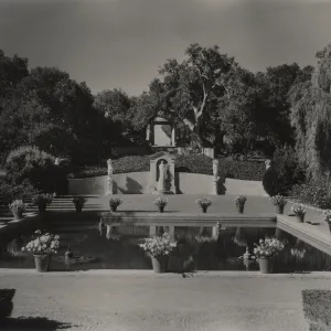 Formal garden with pool and sculptures in Montecito