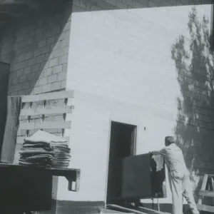 Herbarium construction, view of southwest corner, herbarium cabinets being delivered
