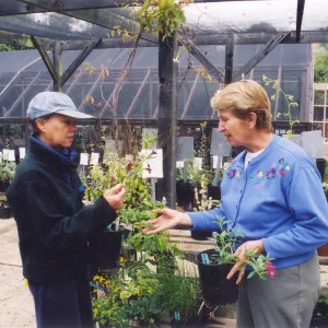 Mary Shehan with visitor in nursery