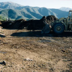 Removal of Mulch pile on ridge above Hort Unit that caught on fire