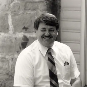 Dr. Edward L. Schneider, in front of Cottage