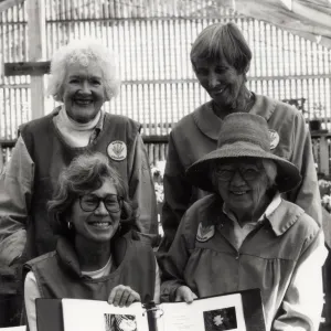 Volunteers - Garden Growers Clockwise from upper left: Betty Himes, Nathalie Hodge, Stevie Service and Betsy Graham; Displaying their new notebook, Fall, â€˜94 - IQ Spring 1993 Ironwood Quarterly