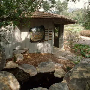 Information Kiosk dedication wall, stone bench