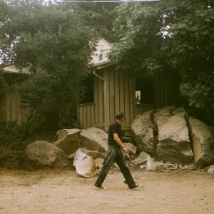 Herbarium Construction. View of pre-herbarium building showing dynamited boulders