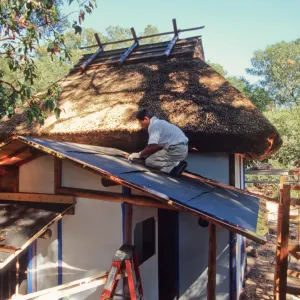 tea house construction copper and thatched roofing ©Marie Gayeski