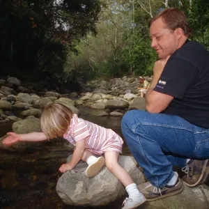 child and father, Mission Creek, Celebration of Trees 1996
