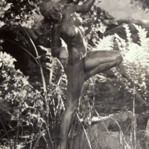 Statue near pond