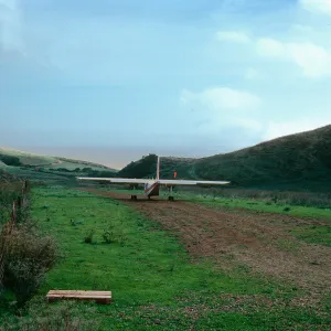 "Islander" taking off on ranch airstrip, Santa Cruz Island